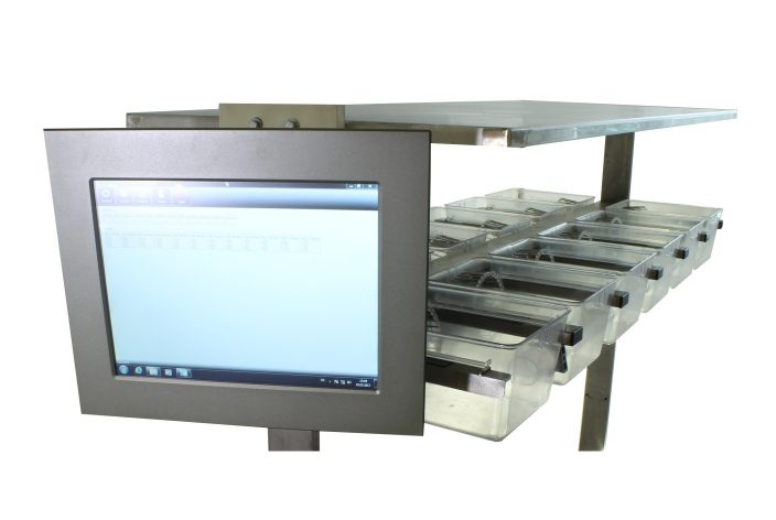 IDrevolyzer with one level of interconnected cages, wheels, and control monitor.